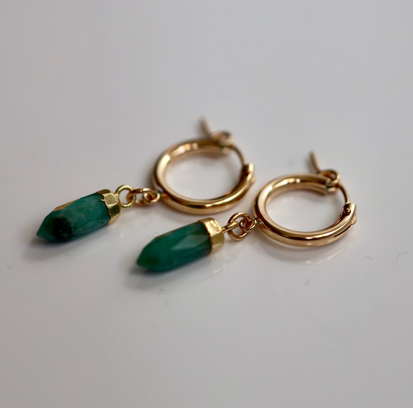 Emerald Huggie Hoops
